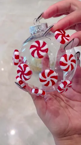 Dollar Tree DIY Ornament Balls✨ ⠀⠀⠀ Quick easy inexpensive to make. Who’s gonna make these?! Click Linktree in My bio then click on DIY to shop the plastic candy canes & peppermints✨  ⠀⠀⠀ #DIY #diyproject #dollartree #dollartreediy #dollartreefinds 