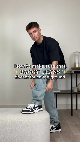 So easy to make the perfect BAGGY JEANS so it doesn’t touch the ground👖 Save for later & hit the + for daily #fashionhacks ✅ #outfitideas #baggyjeans #stylinghacks #outfitsformen 