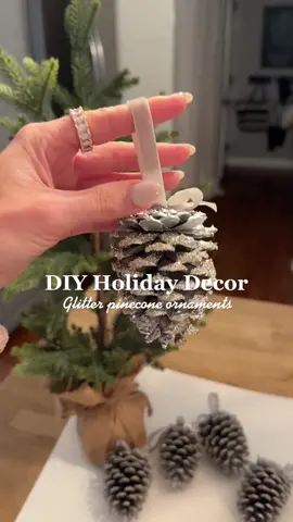 We are loving thes DIY glitter pinecone ornaments! #ornaments #christmas #treedecor 