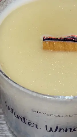 Restocked my winter wonderland candle! This candle smells as pretty as it looks ✨💕#candle #candlemaking #glitter #candlejar #sparklecandle #sayisfying #DIY