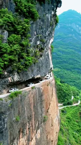 Lanying Grand Canyon Wall Highway. By 23 villagers, with steel drill, hammer inch by inch chiseled out of the cliff road. At an average depth of more than 1,500 metres, it is longer than the Guo Liang Wall Road. #beautiful #healinglandscape #steep #themountains #canyon #landscape 
