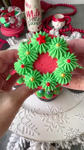 🧁FULL HOW TO AND RECIPE BELOW👇👇 Thie most perfect vanilla bean cupcakes and vanilla frosting. 100% gluten and dairy free.   🧁 1/2 cup vegetable oil  3/4 cup sugar 2 large eggs (room temp)  1 1/4 cups GF 1:1 flour 1/2 tsp salt 1/2 cup oat milk  1 3/4 tsp baking powder 2 tsp @singingdogvanilla vanilla bean paste  Combine oil and eggs in mixer. Next add eggs and mix for 1 minute. Slowly add all remaining ingredients and mix on medium for 1 minute until fully combined making sure to scrape down the sides and the bottom.  Bake on 350 for 13-16 minutes.   Frosting  1 stick DF butter  3 cups powdered sugar  1 tsp @singingdogvanilla vanilla bean paste  3-4 tbsp of DF heavy cream OR 2 tbsp DF milk.   Cream butter and paste in mixer until smooth. Next add your sugar and cream alternating 1 cup/1tbsp at a time, blending slowly after each addition. Once all is added, mix on medium high for about 2 minutes. Separate into 2, and add food coloring.   Once cupcakes are cooled, frost with frosting using a piping bag and a circle tip or just cut the tip off of a bag. Line a tray with wax paper. Gently press cupcakes with icing frosting side down. Freeze for 15 minutes. Remove, then frost using a star tip in circles around the cupcake like a wreath. Add your choice of sprinkles to the wreath immediately. Enjoy!  (I used red food coloring in the first bag for the base, then green food coloring in the second bag for the wreath.)  Makes 12 cupcakes   #christmascupcakesoftiktok #christmascupcakes #cupcakesoftiktok #cupcakedecoratingvideo #cupcakedecoratingideas #holidaytiktok #holidayrecipes #christmasrecipes #christmasbaking #glutenfree #dairyfree #vanillacupcakes #vanillabeancupcakes #fyp #foryoupage #delicousfood #sugarcookies #GenshinImpact33  #vanillabuttercream 