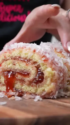 The BEST Mexican Pan Dulce, NIÑO ENVUELTO, Cake Under 15 MINUTES | MEXICAN JELLY ROLL CAKE this is a childhood favorite, now I make it at home and it’s just seriously the BEST, the best part it doesn’t taste soooo much like egg 😅🤭  surprise everyone this Christ as with such a beautiful and delicious cake ☺️❤️  I M P O R T A N T ⚠️  Make sure not to over bake the cake!   Tip!!! WORK QUICK BETWEEN ROLLING AND ADDING THE JAM, ALSO MAKE SURE YOU THIGHT ROLL THE CAKE! Tip 2** USE THE STRAWBERRY TOPPING INSTEAD OF JAM Tip 3** SPREAD A THIN LAYER OF STRAWBERRY INSIDE CAKE  You MUST use a 15X10X1 baking sheet  Ingredients: 8 servings 3 eggs at room temperature 1/2 cup sugar 2 tsp vanilla extract 2 tbsp vegetable oil 2 tbsp milk  1 cup all purpose flour 1 tsp baking powder 1/2 tsp baking soda Pinch of salt 11.7 oz strawberry jam or topping Coconut flakes 1 serving of love 💕   #cakeroll #niñoenvuelto #jellycake #mexican #pandulce #homemade #sweetbread #GenshinImpact33 #fyp #recetasfaciles #howto #bake #cake 