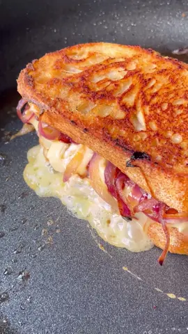 Caramelised Onion & Camembert Toastie   Ingredients: 1 red onion, sliced 1 tsp balsamic vinegar 1 tsp sugar 1 tbsp veggie oil 50g camembert, sliced 2 slices of bread 1 tbsp butter   Method: 1)	Add 1 red onion to a frying pan with a glug of oil and fry for 3 mins.   2)	Drizzle balsamic vinegar and sugar in the pan and fry for a further 5 mins until the onions are soft and caramelised.  3)	Take two slices of bread and top one slice with the fried onions. Layer the sliced camembert and top with the other piece of bread.  4)	Place the frying pan on medium heat and add 1 tbsp of butter. Once melted, add the toastie. Fry on each side for 3 mins or until golden. #bbcgoodfood #christmassandwich #toasties #christmaslunchideas #christmascountdown #christmasrecipe 