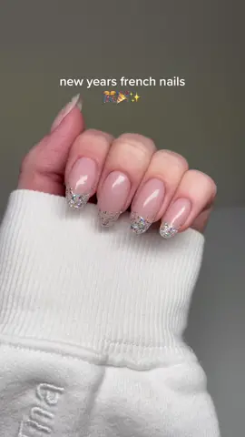 It’s simple yet so cute?? 🥹🫣 using @GELCARE® Prismatic Flakes and Nude BB Cream + cuticle oil #newyearsnails #holonails #frenchnails #nailarttutorial #holidaynails 