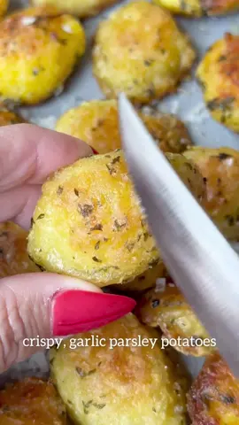 1 1/2 pounds baby yellow potatoes (peeled)  3 tbsp @costabilebrand organic garlic olive oil  2 tsp parsley  1 tbsp cornstarch  1/2 tsp gluten free flour  2 tsp salt  Add oil to a baking sheet. Place in oven on 425 degrees. Leave sheet in oven for 15 minutes.  Cut potatoes in half. Place water in large pot and add potatoes. Bring to a boil and allow to boil for 10-12 minutes. Remove and drain. Allow to rest for 5 minutes. Place back in pot, add all dry ingredients. Add lid and shake well until covered. Place on baking sheet into hot oil and bake on 425 for 12 minutes. Remove and flip. Repeat this process until both sides are crispy, about 40-45 minutes. Enjoy!  #crispypotatoes #garlicpotatoes #roastedpotatoesrecipe #roastedpotatoes #roastedgarlicmashedpotatoes #mashedpotatoes #potatoes #potatorecipes #ReasonForBooking #CODSquadUp #airfryerrecipes #glutenfree #vegan #veganrecipes #glutenfreerecipes  #showyourglow 