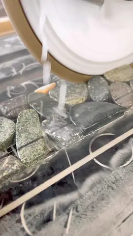 Pebbles in a linear drain. 1/8” wedi board works great in these situations. #tile #construction #tiletok #satisfying 