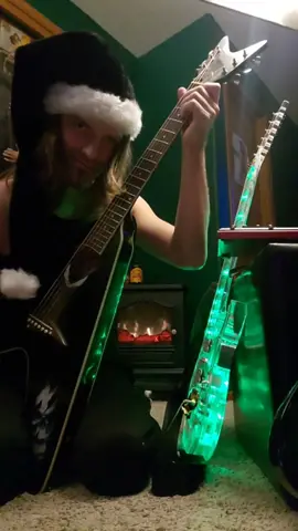 OH YEAH ?¿ Some Neoclassical Acoustic Tapping on my flying v Acoustic 🤘 #classical #neoclassical #tapping #guitar #Santa #fireplace #fire #evh #vanhalen #Acousticguitar #shred #Acoustic #fingerstyle
