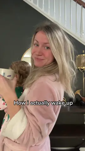 Baby in arms. Coffee in hand. Hair a mess. Red patchy skin. This is real. This is me 😂. #howtiktokthinksiwakeup #versus #howiactuallywakeup #noshame #bedhead #momlife 