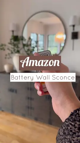 Under “Home Decor” on website. I have wanted sconces on this wall for so long, but didn’t want to pay the electricion bill. I am obsessed with these LED battery operated sconces, it took all of 20mins to put up. Great for renting and decorating on a budget 🤎  #amazonhome #amazonhomefinds #decoratingonabudget #diylighting 