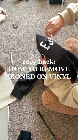 easy project hack: how to remove heat pressed ironed on vinyl from material!! hope this helps! #projects #cricutprojects #diyhack #howtoremovevinyl #vinylhack #crafthack 