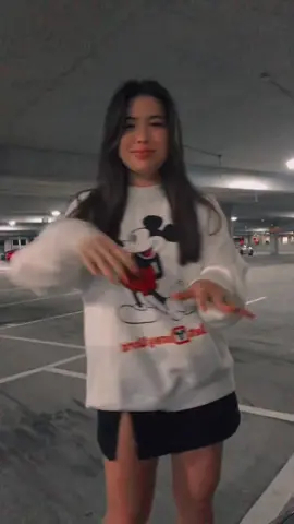 A little moment for my favorite new sweater #disneysprings #disneysweater #mickeysweater #disneymerch 