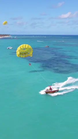 Floating on cloud nine above Punta Cana ☁️🌴 Soaring over crystal clear waters and taking in the stunning views on this parasailing adventure 🪂🌊 📸 tomek_c (IG)   #PuntaCanaAdventures #PuntaCana #TravelGoals #Parasailing #DominicanRepublic #Explore #AdventureTime #BeachVibes #TropicalParadise #VacayMode #BucketList #tiktoktravel #puntacanavacation #puntacana2023#PepsiApplePieChallenge 