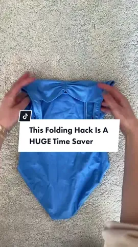 The best way to fold dance leotards, bodysuits, and bathing suits to save space and TIME. Make it so much easier to find clothes, keeps you organized and a HUGE time saver. #dance #dancemom #momhacks #foldinghacks #foldingclothes #organize #packing 