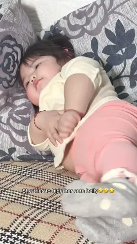 She is just trying to hide her cute little belly#baby #cute #adorable #funny #babygirl #foryou 