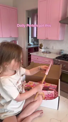 She thinks Dolly sent it to us and I will never tell her shes wrong 🫶🏻🥹💗✨ #dollyparton #dollysdesserts #dollywood #dollypartonbakingcollection @Dolly Parton #toddlertok #pinkkitchen #pinkhouse #unboxing #kitchenunboxing #pinkkitchenstuff #pinkdecor 