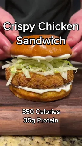 Crispy Chicken Sandwich 🍔 Total Macros: - 350 Calories - 35g Protein - 35g Carbs - 11g Fat Ingredients: - 1 Pound Ground Chicken Breast - Garlic Salt - Onion Powder - Black Pepper - 1 Tbsp Yellow Mustard  - 1 Cup Flour  - 1/2 Cup Egg Whites - 1 Cup Panko Bread Crumbs  - 4 Buns - 6 Tablespoons Light Mayo - Shredded Lettuce  #food #cooking #chickensandwich #Fitness 