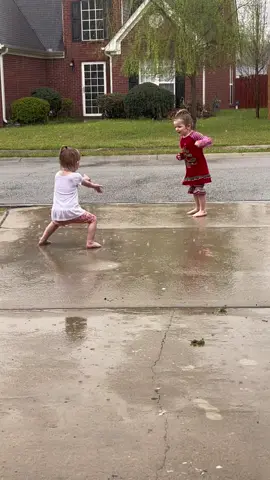 S P L I S H. S P L A S H. 🌧️ #play #AXERatioChallenge #letthembelittle #foryou #rain #rainyday #sisters #outside 