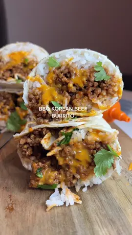 BBQ Beef Korean Burrito 😮‍💨🤤 this tasted absolutely frickin BANGING & it’s so QUICK and super EASY  for some veggies add in some peppers & onion (we were due a shop!) Ingredients (serves 2):  200g lean beef mince Tsp sesame oil Tsp ginger Tsp garlic  20g gochujang paste - sub chilli paste if you can’t find but start gradually  15g light soy sauce  30g bbq sauce  2 packs of veetee long grain rice  2 Tortilla wraps  Sriracha mayo (I use the goose brand but you can also just get sriracha sauce & lox with mayo or any sort of spicy mayo would work)  Coriander  Step by step ⬇️  - Start frying off the mince and add in the ginger and garlic - Once the mince has started to brown add in the gochujang paste, soy sauce and bbq sauce  - Warm up your rice if using microwaveable  - Warm your tortillas for 10 seconds, add the rice, beef, sriracha mayo and coriander  Calories per burrito: 556 Protein: 37g Fat: 10g Carbs: 75g • ——— #burritos  #beefrecipe   #quickandeasymeals  #caloriedeficit  #highproteinmeals #recipeideas #dinnerrecipes #lowcalorierecipes  #macrofriendly   calorie deficit meals  low calorie recipes high protein dinner burrito recipes 