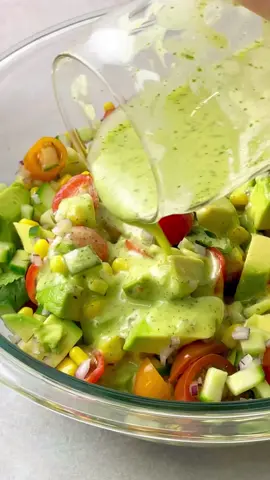 AVOCADO SALAD WITH CILANTRO LIME DRESSING - This salad makes a healthy dinner and the perfect side to any meal. #saladrecipe #avocadosalad #saladdressing  Salad Ingredients 6 leaves butter lettuce ½ cup corn 1 hass avocado diced (more oil and fat percentage, creamier, and preferred) ½ English cucumber diced ¼ cup red onion finely diced cherry tomatoes sliced in half Lime Cilantro Dressing ¼ cup cilantro leaves loosely packed ¼ cup white wine vinegar ¼ cup olive oil 2 tablespoons lime juice 2 tablespoons maple syrup ½ teaspoon Dijon Mustard ⅛ teaspoon salt