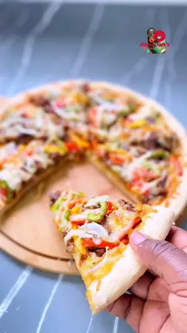 Homemade Pizza 💖INGREDIENTS 🍕2cups bread flour or all purpose flour 🍕1 tablespoon sugar 🍕1 tablespoon  🍕1/2 teaspoon salt 🍕1 tablespoon yeast 🍕2 tablespoon oil 🍕3/4 cup lukewarm water 🍕2 tablespoon flour for dusting 💖PROTEIN 🍕250g beef flesh 🍕1 tablespoon beef seasoning 🍕2 tablespoon oil 🍕1 tablespoon chili powder 🍕1 teaspoon black pepper 🍕1 teaspoon rosemary 💖ADD ONS 🍕Red bell pepper 🍕Green bell pepper 🍕Yellow bell pepper 🍕Onions 🍕Mozzarella cheese 🍕Pizza sauce 💖NOTE 🍕please if you want your pizza bread thick you can increase the measurement of the dough 🍕I will share my pizza sauce recipe soon or you can use normal tomatoe stew 🍕you can use any protein for this recipe ENJOY💖 #pizza #homemade #pizzapizza #pizzalivesmatter #beefpizza #ghanatiktok🇬🇭 #ghana #ghanafood #viral #fy #fypシ #FoodTok #tiktokrecipe 
