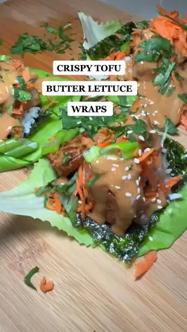 Crispy tofu butter lettuce wraps 🥬🥕 1/2 block of extra firm tofu 1 tbsp soy sauce/ tamari 2 tbsp oil 1 tsp Garlic powder  1/2 tsp salt Pepper  2tbsp Cornstarch  Bake @400 for 25-30mins Sauce:  1/3 cup peanut butter 1 tbsp soy sauce ( maybe more if butter is unsalted) 1 tbsp sesame oil 1/2 a lime 1/2 tsp of sriracha 1/2 tsp garlic paste 1/2 tsp ginger paste 2 tbsp coconut sugar  Warm water  Seaweed Rice, carrots,spring onion, cilantro Butter lettuce, sesame seeds #EasyRecipes #vegan #veganfood #veganmealideas