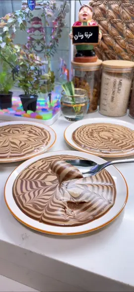 حلا البسكويت   المقادير ب فيديو  استخدمت  علبه بسكويت كامله بيها اكثر من ٣٠ قطعه بسكت ملعقة كبيرة شكر كوب ونص حليب سائل  ملعقه صغيرة فانيلا سائلة  قشطه كي دي دي حجم كبير  نخليهم بالخلاط ونخلطهم (اي مشكله بالخليط اذا صار سائل تكدرون ضيفون قطع بسكت واذا ثخين ضيفو حليب)ونقسم الخليط الى قسمين ونضيف عليه كاكاو باودر او نوتيلا يعجبكم او اي كاكاو متوفر عدكم  اذا تحبون مقادير اقل  ٢٠ قطعه بسكت  كوب حليب  علبة قشطة حجم صغير  نص ملعقه شكر  رشه فانيلا سائله  والف عافية  #اكسبلور #اكسبلور_فولو #أكسبلور #اكسبلور_ضيفونا #اكسبلور_ضيفونا #اكسبلور_لايك_كومنت_فولو_ي_عسل #اكسبلور_لايك_كومنت_فولو_ي_عسل #اكسبلورexplore #اكسبلور_تيك_توك #اكسبلووووورررر 