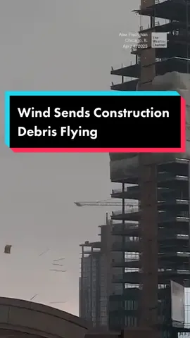 Strong winds from approaching thunderstorms sent debris flying in Chicago. #theweatherchannel #fyp #weatherchannel #wind #chicago #storm #consrtuction #chicago #illinois 
