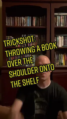 Over the shoulder, no look, into the bookshelf trick shot. (Yes, sometimes I subconsciously whistle to give it sound effects. And yes, I hit myself in the head.)  #trickshot #throwingbookontoshelf #books #virtuallyme #BookTok #middlegrade #middlegradebooks #middlegradereads #middlegradecovers #middlegradefiction #middlegradelit #mglit #mgbooks #mgreads #childrensbooks #kidslit #booklover #booknerd #bookworm #funwithbooks
