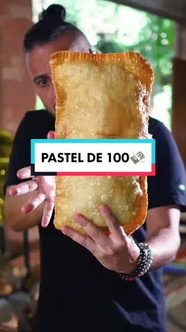 Fiz um pastel com 100💸😱 Ingredientes👇: 900g de filé mignon  3 dentes de alho picados  500g de catupiry  300g de mussarela  1 pacote de massa de pastel em rolo 4l de óleo Sal e pimenta do reino a gosto  Preparo: Corte o filé mignon em tirinhas e leve para grelhar em fogo alto com um fio de óleo, acrescente o alho e tempere com sal e pimenta. Misture o catupiry, espere derreter e reserve. Corte dois pedaços iguauis de 40cm da massa de pastel. Espalhe a mussarela e despeje o recheio em toda a massa. Cubra com a outra folha da massa e feche as laterais da massa apertando com um garfo.  Leve para fritar em bastante óleo aquecido a 180° até dourar. #desafio #pastel #fy #receitas 