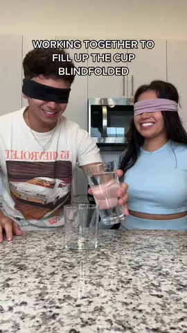 Half of it didn’t even go in the cup 🤣🤣 #fyp #blindfolded #coupleschallenge 