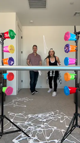 Part 2- Don’t choose the wrong cup 😲 #hookthehangers #partycups #mysterygifts #wifeandhusband #challenge #throw #hangers 
