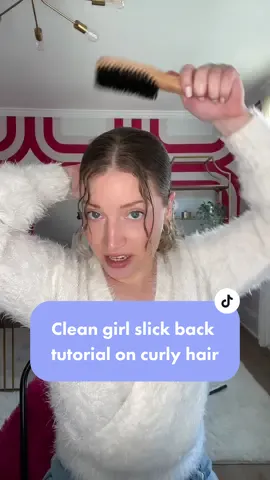 The “clean girl” slick back tutorial on curly hair! I do this curly hairstyle between wash days when I really cannot get any more refreshes out of my curls! ##cleangirl##slickbackponytail##curlyslickback##curlyhairstyles##curlybunusing @@igkhairgel 