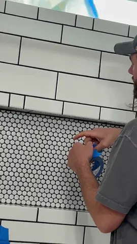 Fixing grout holes in shower 🛀 #shorts #shower #tileshower #builder #DIY #homediy #construction #reels #fyp 