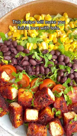 CRISPY CAJUN TOFU SALAD BOWL INGREDIENTS  ▪️1 pack of extra firm tofu, drained and pressed  ▪️2-3 tbsp of Cajun spice  ▪️1 cup flour or GF oat flour if gf ▪️1 cup m*lk  Salad of your choice.  METHOD  ▪️Drain, press, and dry your tofu.  ▪️Cut into 1 inch rectangles  ▪️Mix milk and flour in one bowl to create a batter, if too thick add in more milk slowly ▪️In a separate bowl add the Cajun spice ▪️Dip each piece of tofu in batter first, then add to Cajun spice mix  ▪️Heat some oil in a fry pan over medium heat ▪️Fry tofu on each side until golden brown Can also air fry or oven bake  #tofu #tofurecipes #healthyrecipes #saladbowl #saladrecipe