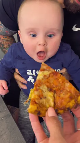 First taste of pizza, inspecting the cheesy goodness 🕵🏻‍♂️🍕 #6monthsold #babytiktok #babyreacts #babyreaction #funnybaby #pizza #fypシ 