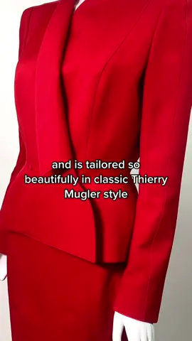 Incredible dramatic vintage Thierry Mugler power suit from his Spring 1999 collection  Truly an amazing fashion piece, this ensemble features a long sleeve jacket and a pencil skirt and is tailored so beautifully in classic Thierry Mugler style. In a bold striking red colour this eye-catching vintage suit features shoulder pads, a curved fin-like lapel which can be worn open or closed, a perfectly tailored cinched waist, two snap button closure and elegant long sleeves. The pencil skirt is fitted and falls above the knee. This vintage suit creates an incredible hourglass silhouette with the highest quality tailoring. #thierrymugler #mugler #vintagefashion #fashion #fashionhistory #fashiontok 