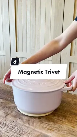 Magnetic Wooden Trivet 🥘 Place your cast iron skillet or pot on top of our Hold Everything trivet and it will instantly attach itself for an easy trip to the table for serving. Crafted of densely grained FSC-certified ashwood, the trivet is extremely durable. Shown here with #LeCreuset Shallot 💗 Agave 💙, Olive 💚 and Nectar 💛. Shop with the link in bio. #oventotable #LeCreuset #WilliamsSonoma #cookware 