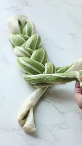 ~ Matcha Marble Loaf ~  *Recipes make 2 mini cube loaves OR 1 regular loaf* *Sweet stiff starter* – triple in 7-8hrs at 27-28C 30g starter 90g bread flour 40g water 15g sugar *dough* 230g bread flour 20g sugar 4g salt 165g milk 20g butter  All of the sweet stiff starter Medium matcha paste - 4g matcha powder + 8g water Intense matcha paste - 10g matcha powder + 20g water  Method  ➡️ Prepare sweet stiff starter and use when it triples, about 7-8hr at 27-28C. ➡️ Mix everything except butter till dough comes together and is strong. ➡️ Add butter gradually and knead until fully incorporated and dough achieves window pane. ➡️ split dough into 3 equal parts ➡️ add one part of dough with medium matcha paste, knead to combine ➡️ add another dough with intense matcha paste, knead to combine  ➡️ Rest all three dough for 15mins ➡️ Roll out the dough in long strips. Stack one on top of another and roll up ➡️ Cut into three stripes and braid it  ➡️ Place into the greased tin for final proof, 3.5-4hr at 28C.  ➡️ Bake at 180C -25mins for mini loaf -40min for regular loaf  * mini loaf tin - 10x10x10cm * Regular loaf tin - 20x10x10cm #matcha #matchaloaf #matchabread #sourdough #sourdoughloaf #sourdoughbread #tricolor #naturalyeast #wildyeast #naturallyleavened #sweetstarter #sweetstiffstarter #sweetlevain #levain #wakatake #matchamarblebread #marblingbreed #matchamarbelloaf #matcha #greentea #greenteabread #marblebread 