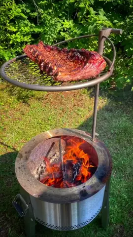 Get ready to have your ears massaged by the vocal equivalent of melted butter, folks, because my good friend Dan at @BBQBOURBONBARBELLS  is bringing the heat with his solid deep voiceover skills! And what better way to pair Dan's voice than with some Live Fire Beef Back Ribs? These ribs may not have a ton of meat on, but cooking them over a love fire is like falling in love - it's a passionate and exciting experience. And when those ribs finally hit your mouth, they're so crispy and juicy, it's like they're saying 