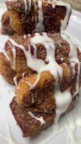 Brunch just got 10x better with these French toast bites that you can probably make with items you have in your kitchen currently!!  These bites were inspired by my almost stale Hawaiian rolls I forgot about (stale-ish bread makes great French toast btw) and now I’m not going back!!  Like this video if you’d give these a try and follow for more deliciousness ❤️  #cinnamonsugar #brunchideas #frenchtoast #frenchtoastrecipe 