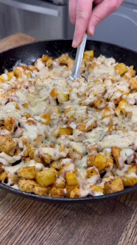 Garlic Parmesan Chicken & Potatoes is an easy weeknight dinner! My cookbook is NOW available for preorders!  Recipe •2 chicken breasts •4 - 5 small/medium sized potatoes •olive oil + salt, pepper, garlic powder, paprika (for potatoes) •2 TBSP of butter  •1/2 tsp each of salt and pepper •1 tsp each of paprika, onion powder, and Italian seasoning  •2 TBSP minced garlic  •Buffalo Wild Wings Garlic Parmesan Sauce  •1 cup of shredded mozzarella cheese Instructions  •wash potatoes, peel, and cut up into small cubes •toss with olive oil, salt, pepper, garlic powder, and paprika (I don’t use exact measurements for this part)  •cook potatoes in the air fryer at 400 degrees for about 20 minutes shaking them around at least a couple times while they cook •once potatoes are cooking, cut chicken into cubes •cook chicken in a skillet on medium high heat with a little butter  •season chicken with 1/2 tsp each of salt and pepper, 1 tsp each of paprika, onion powder, and Italian seasoning  •once chicken is finished cooking add minced garlic and the garlic Parmesan sauce  •add cooked potatoes to the skillet  •top with shredded mozzarella cheese •broil in the oven for just a few minutes to melt the cheese (you could also cover with a lid and let this sit on the stove until cheese melts) Enjoy!  #easydinners #recipes #weeknightdinner #easymeals #dinner #potatoes #chickenrecipes #garlicparm #garlicparmesan 