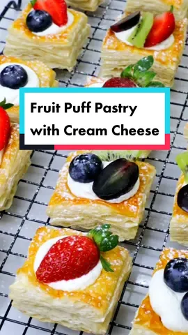 Hello semuanya, hari ini aku buat cemilan enak & simpel banget 🔥 Tampilannya juga cantik dan menarik 🥰 Untuk isian buah bisa disesuaikan dengan selera yaa. Disini aku pakai buah strawberry, blueberry, kiwi dan anggur.  Fruit Puff Pastry With Cream Cheese  Bahan :  2 lembar puff pastry  Olesan : kuning telur  Bahan filling :  100gr cream cheese  25gr gula halus  150 whip cream Pelengkap :  Buah sesuai selera  Taburan gula halus  Oven : 200°C - 15 menit - api atas bawah #resepenak #resepsimpel #pastry #puffpastry #creamcheese #fruit #reseppastry #danish #snack #dessert #cemilan #SnackTime #homemade #homebake #bake #baking #resep #olahanpastry #pastrylife #sweets 
