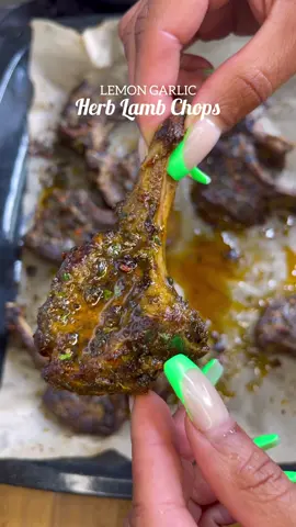 MOUTHWATERING LEMON GARLIC HERB LAMB CHOPS AND MINT SAUCE 🎯🤯🥵 (dm me on my instagram for full recipes, links in my bio). . . #lambchops #foodinspo #yummy #deliciousfood #fyp #foryoupage #garlicherblambchops #viral 