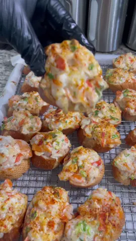 Instagram @nuocmamafoods SHRIMP 🍤 AND CRAB 🦀 TOAST Old recipe, but always a favorite at parties, pot luck, etc… You can make the filling ahead of time(1-2 days) in the fridge. Ready to bake when guests arrive.  Recipe:  • sliced bread 🥖 (any kind) baguette works the best •1 lbs roughly chopped raw shrimp  •1 lbs roughly chopped immatation crab (optional real crab)  •1/2 cup chopped green onions or more if prefer. •2 egg white ( help filling get puffy and fluffy) •1/2 cup mayonnaise •1/2 teaspoon ground pepper  •1 teaspoon sugar  •1 teaspoon garlic salt  •paprika  Mix well together and refrigerated for 15 minutes.  Preheat oven to 400f 1•Scoop a spoon full of filling on top of the sliced bread (be generous, no body want toast with skimpy topping ). Sprinkle with paprika  2•Place toast on top of cooling rack inside a baking pan. Or just line the baking rack with parchment paper.  3•Bake for 20-25 minutes on the middle rack at 400f.  Add a few more minutes if prefer more toasty.  Ps, you can substitute imitation crab with real crab if preferred. Me, personally think imitation crab works better with this recipe.  Enjoy 😉#s#shrimptoastc#crabtoastt#toasta#appertizer#b#butterb#buttertoastn#nuocmamafoodss#sweettoasts#snackn#nuocmamafoodsv#vietnamesehomecookingn#nuocmamafoodsv#vietnamesefoodv#viethomecookingv#viethomemadev#vietnamesehomecookingv#vietnameseshomecookfoodv#vietfoodv#vietfoods#b#banhmibread #chickenwar #chickenwars #chickenwar2023 #chicken 