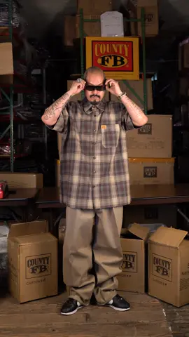 SHORT SLEEVE CHECKER FLANNELS ARE BACK IN STOCK. Get your weekend fit! #fbcounty #90s #gangster 