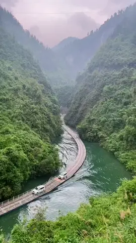 The most beautiful wooden floating bridge.  📍Located in Xuan'en Country of Southwestern Hubei Province, in People's Republic of China, the Shiziguan floating bridge is one of the most spectacular bridges in the world.  ------ #bridge #china 