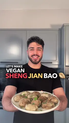 Sheng Jian Bao is a popular Chinese dish. Here's a vegan version of the recipe: Ingredients: For the dough: * 2 cups all-purpose flour (or more if needed) * 1 tsp instant yeast * 1/4 tsp salt * 3/4 cup warm water For the filling: * 2 cups mushrooms, finely chopped * 1 cup firm tofu, crumbled * 2 green onions, finely chopped * 2 cloves garlic, minced * 1 tbsp soy sauce * 1 tbsp hoisin sauce * 1 tbsp sesame oil * 1/2 tsp sugar * 1/4 tsp black pepper *2 Tbsp Tahini (forgot to film) 1. Mix flour, instant yeast, and salt. Add warm water and knead into a smooth dough. Let it rise for 1 hour. 2. Heat some oil in a skillet and sauté the mushrooms until they start to brown. 3. Add tofu to the skillet and continue stirring for a few minutes until the tofu is heated through. 4. Add green onions, garlic, soy sauce, hoisin sauce, sesame oil, sugar, tahini, and black pepper, to the skillet. Stir well to combine all the ingredients. 5. Remove the skillet from heat and set the filling aside to cool. 6. Punch down the dough and divide it into small portions. Roll each portion into a circle. 7. Place the cooled filling in the center of each dough circle and seal the buns. 8. Heat oil in a skillet. Cook the buns sealed side down until they turn golden brown. 9. Add water to the skillet, cover it, and steam the buns for 3-4 minutes until the water evaporates. 10. Remove the lid and cook for an additional 1-2 minutes to crisp up the bottoms. 11. Serve the hot buns with soy sauce or your preferred dipping sauce. Enjoy! ⁣⁣ ⁣⁣ ⁣⁣ ⁣⁣ #vegandumplings #veganessen ⁣⁣ #veganfoodshare #dumplingrecipe #asiancooking #japaneserecipe #vegan #veganrecipes #veganrecipe #chinesefood #veganmealprep #dumpling #japanesefood #veganasianfood #vegancooking #gyoza #veganmeals #dumplings #veganfood #asianvegan #veganesrezept #vegancooking #dumplings #veganrecipe #chinesisch #simpleveganfood #veganerezepte #dumplinglove #veganrecipe #vegan #japanesevegan 