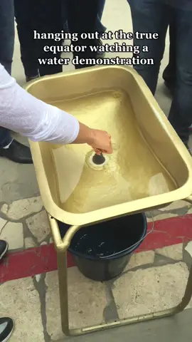 water goes straight down at the equator, clockwise in the south, & counterclockwise in the north. I loved her & everyone we met.. I miss Ecuador 🥲 #water #demonstration #equator #north #south #Ecuador #ecuador🇪🇨 #quito #quito_ecuador #magic #dog #fyp #foryou  