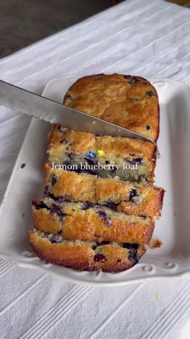 lemon blueberry bread🫐🍋 recipe posted below and in my bio! Ingredients * 1 cup granulated sugar * 1/2 cup butter unsalted * 2 large eggs * 1 tablespoon lemon zest * 2 tablespoons lemon juice * 1/2 teaspoon salt * 1 1/2 cups all-purpose flour + 1-2 tbsps of flour * 1 teaspoon baking powder * 1/2 cup whole milk * 1 cup whole fresh blueberries Instructions * Preheat your oven to 350°F and line a loaf pan with parchment paper * In a medium bowl, sift together the flour, baking powder, and salt. Set aside. * In a small bowl, mix the blueberries with 1-2 tbsps of flour until the blueberries are coated. Set aside. * In a separate bowl, cream together the butter and sugar until light and fluffy, about 3 to 5 minutes.  * Beat in the eggs, lemon juice & zest. Gradually add the dry mixture in. Slowly add in the milk and once the batter comes together, scrape the sides of the bowl. Fold in the  blueberries.  * Pour the batter into the prepared pan and bake for 55-65 minutes. The top of the loaf will be cracked, raised, golden brown in color, and firm to the touch. A toothpick inserted into the center of the loaf should come out clean once ready. * Let loaf cool, then enjoy!  #bakingrecipe #summerdessert #springrecipes #lemonblueberryloaf 